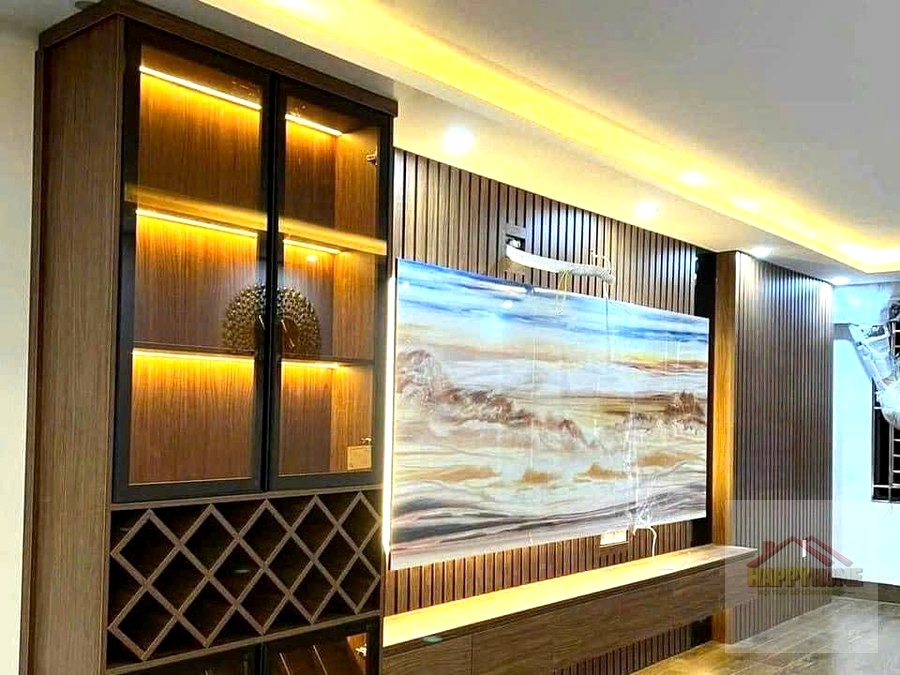 Vách tivi gỗ walnut kệ kính tranh sơn thuỷ LED